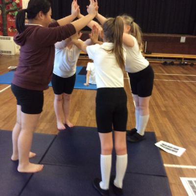 Class 10 learning new gymnastics in P.E