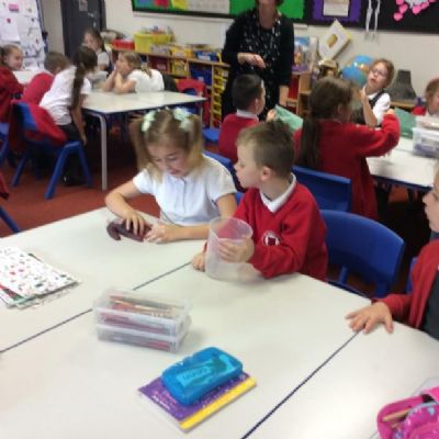 We used red coloured water and plastic gloves to create our own version of hands without bones.