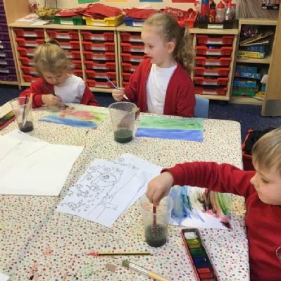 Water colour poppy field painting in EYFS