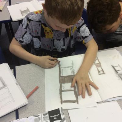 Year 6 have been drawing their own chair based on a book called ‘The Day War Came’.