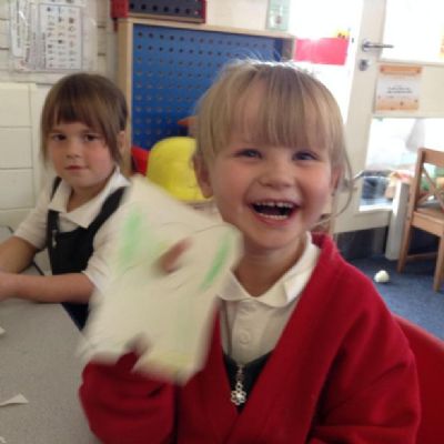 We cut out and coloured our own elephant puppets