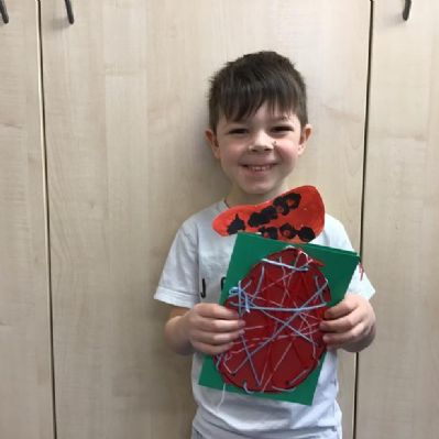 Sewing eggs and making moveable animal cards using paper springs and pop up tabs