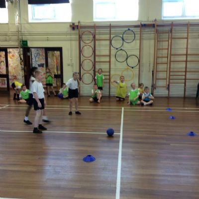 Class 6 having fun playing dodgeball